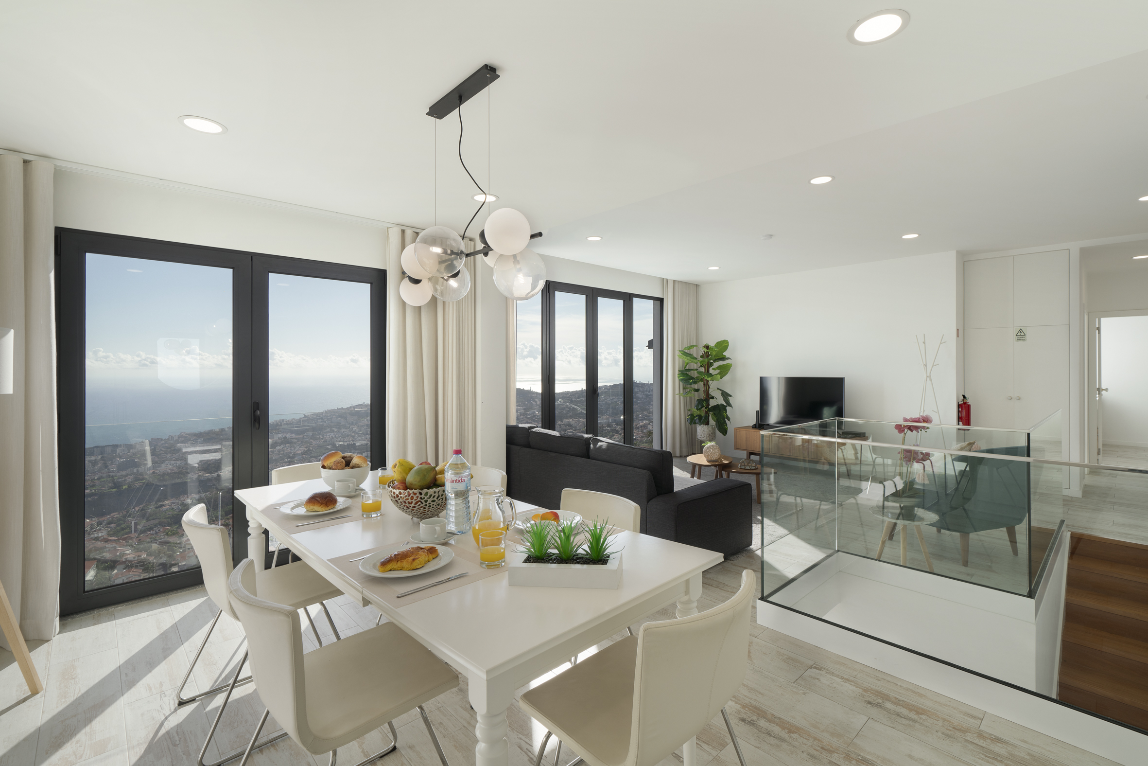 Minte Whire House Villa In Funchal Living Area And View Over The Town And Sea