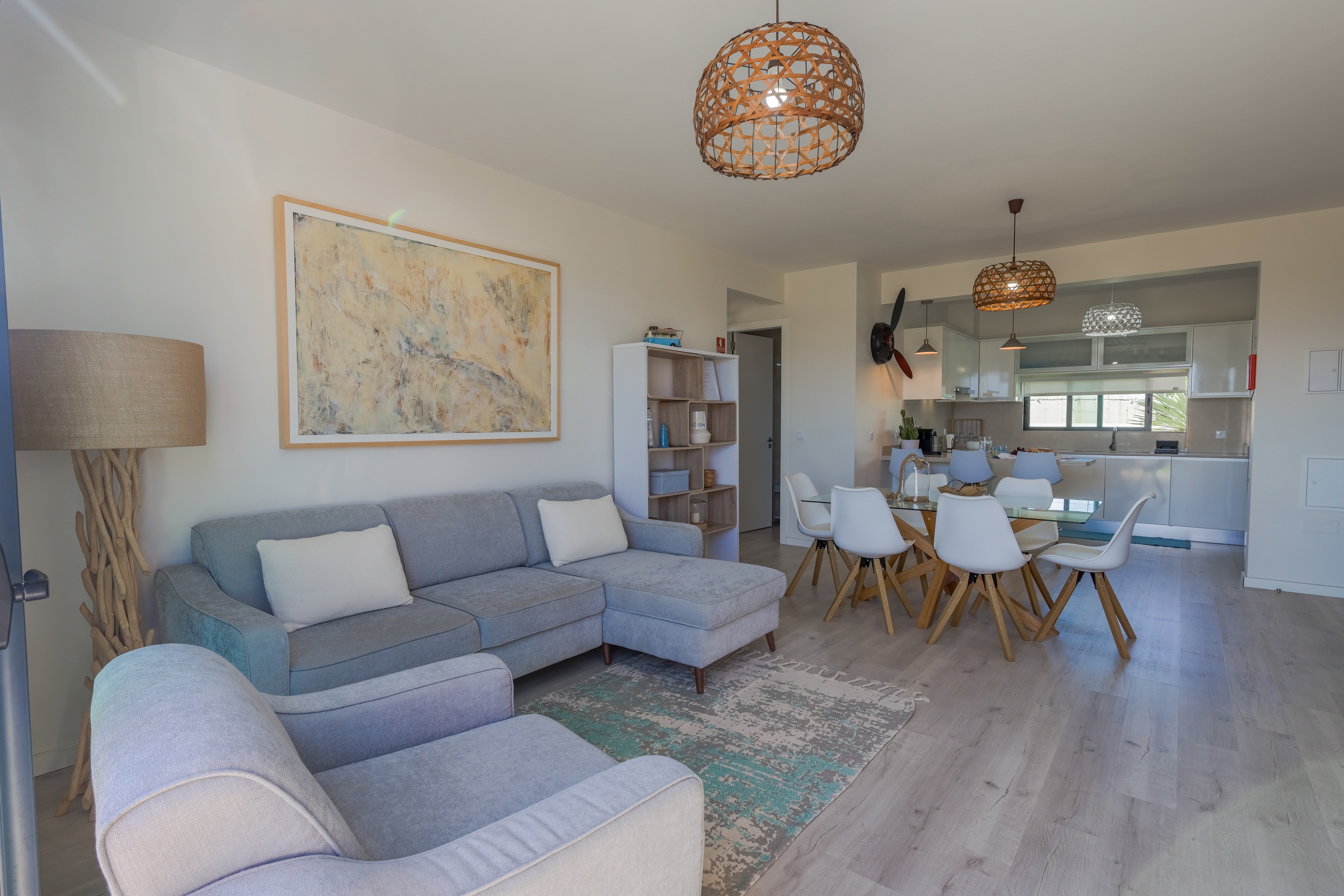 The Spacious Open Plan Livjng Area And Contemporary Kitchen Of Vila Diana In Porto Santo By Ourmadeira