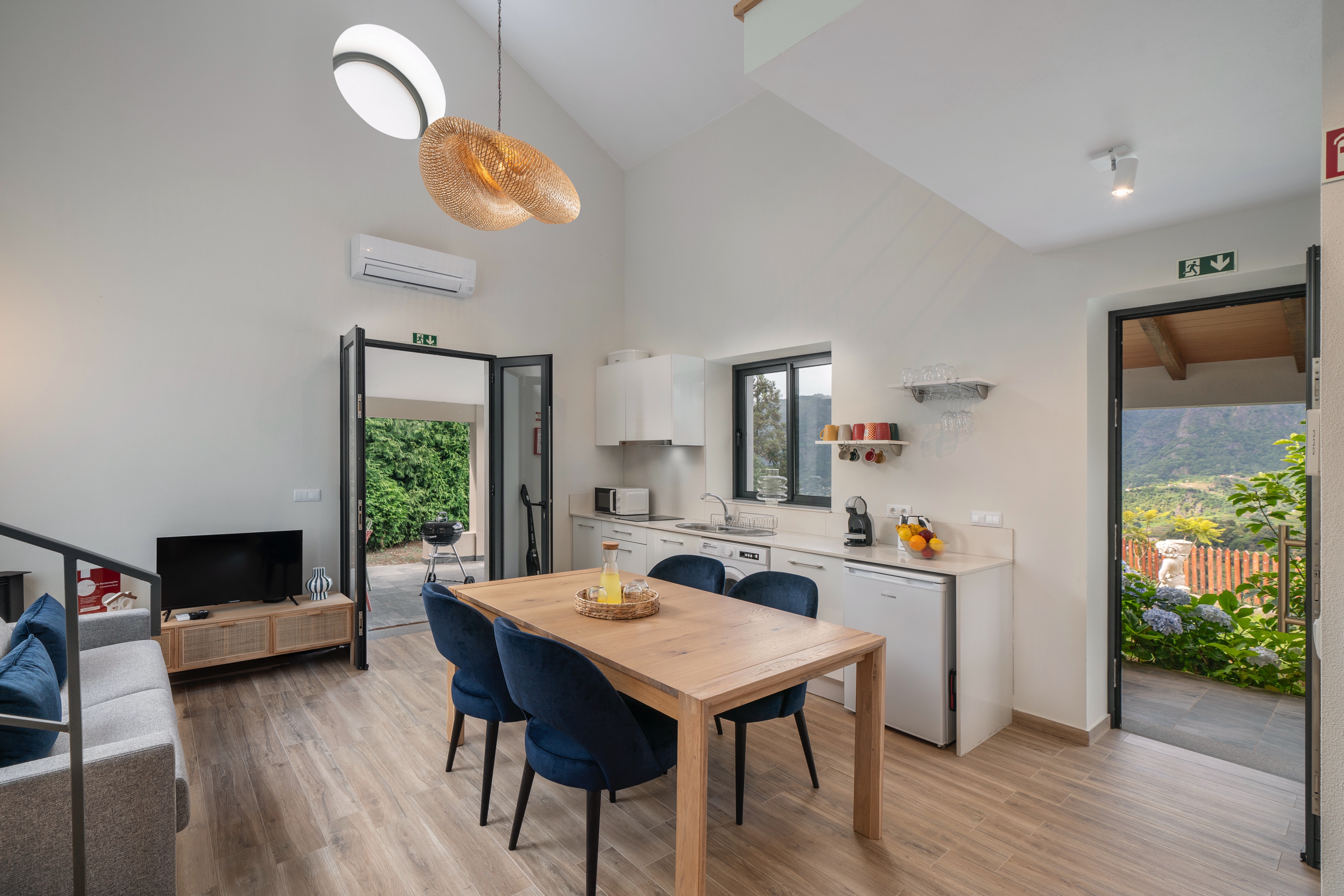 The Open Plan Living Area And Kitchen Of Casa Hortensia By Ourmadeira Showing The Views