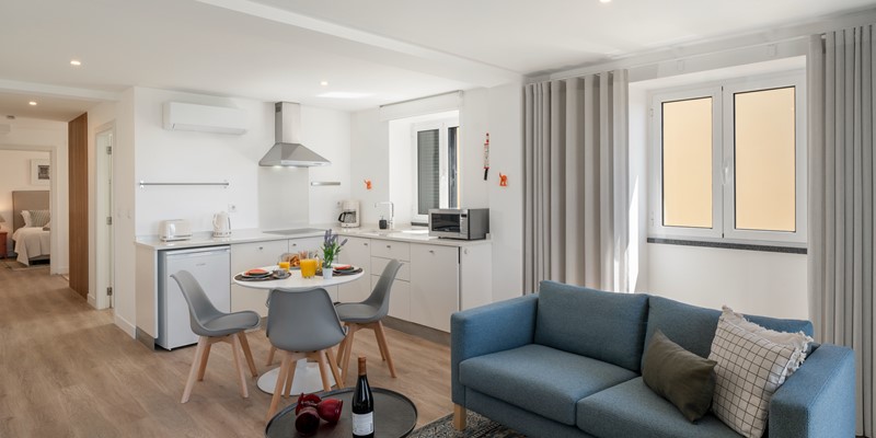 Ourmadeira The Fort Of Old Town With A Charming Small Apartment Showcasing A Kitchen And Living Room In A Warm Inviting Layout For Everyday Living