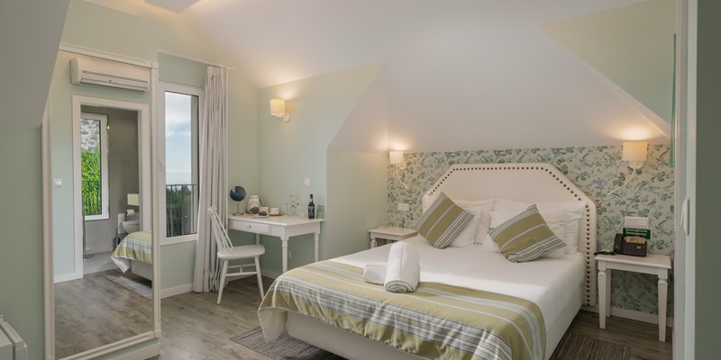 The Air Conditioned Bedroom And Work Desk At Babosas Village Loft Bedroom 42 By Ourmadeira