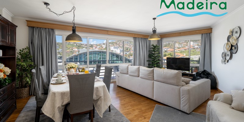The Large Dining And Living Area With Front Veranda At Alamos Uptown By Ourmadeira