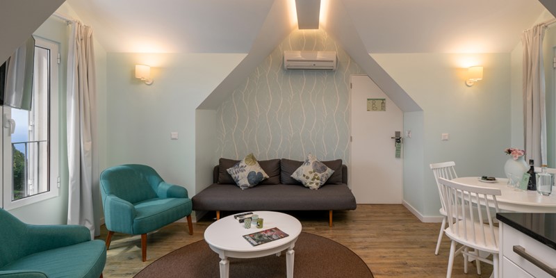 Babosas Village By Ourmadeira Loft Suite Living Area And Sofas