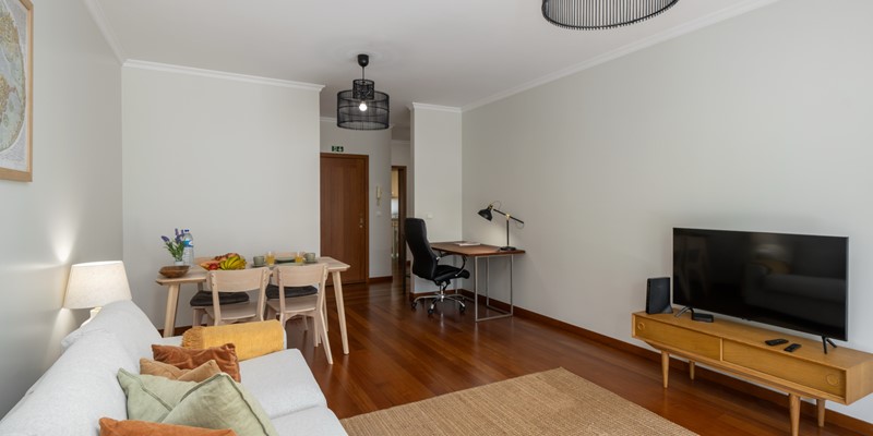 The Open Plan Living And Dining Room And Flat Screen TV At Madalena Living By Ourmadeira