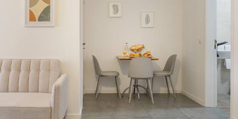 The Open Plan Living And Dining Area At Apartamentois Taberna Studio 2 By Ourmadeira