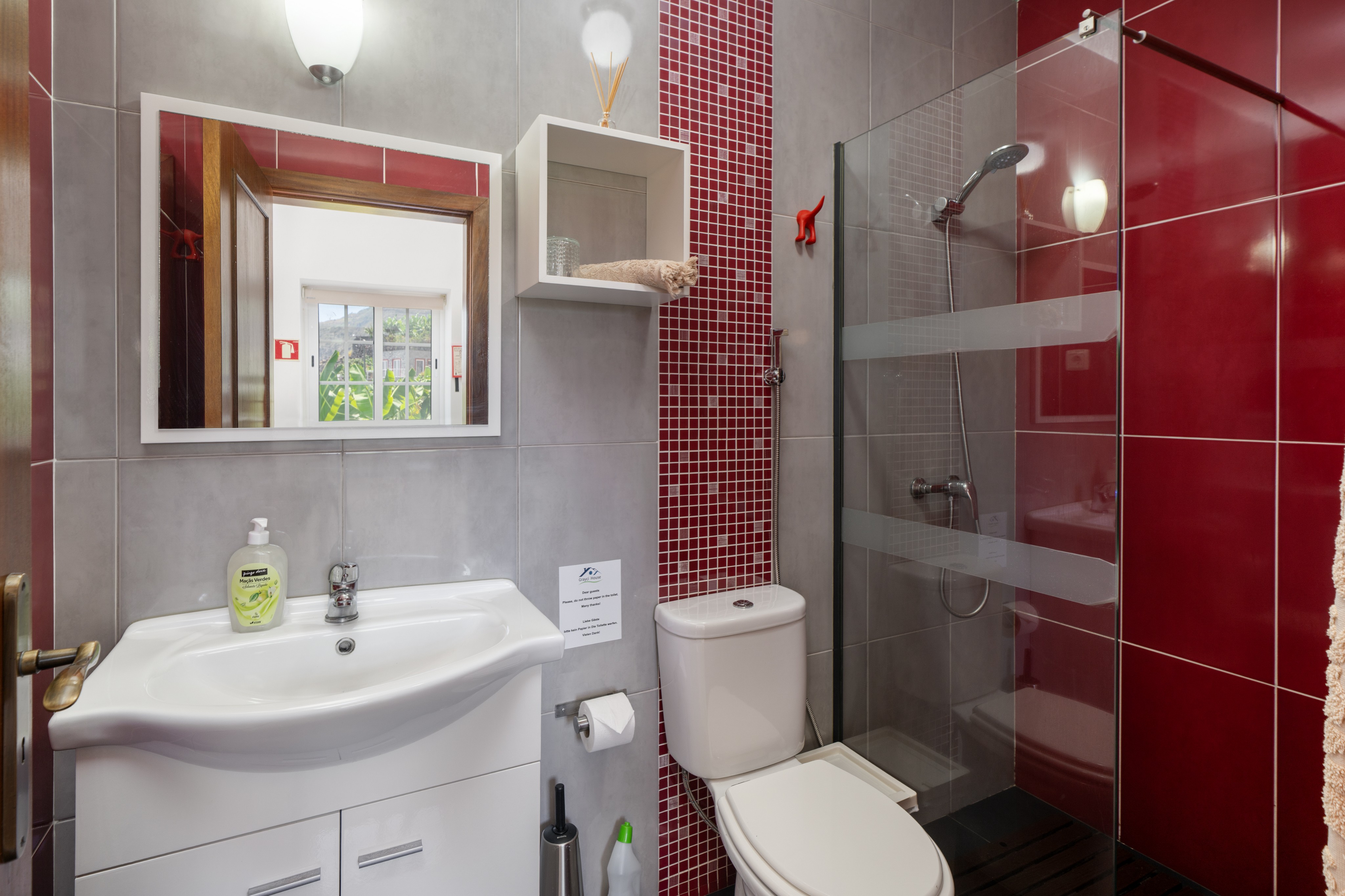 Additional Full Bathroom At Graycis House By Ourmadeira Featuring A Spacious Walk In Shower Stylish Fixtures And A Warm Inviting Design