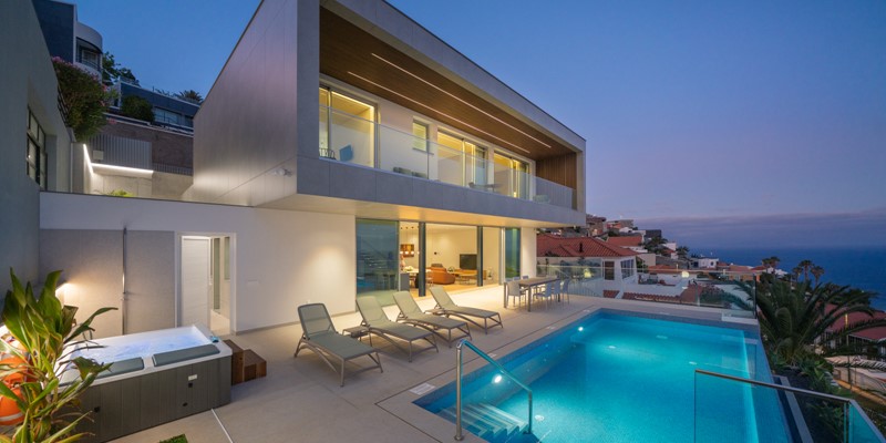 The Amaizing Nightly Views Over The Modern Villa With Swimming Pool And Jacuzzi At Villa Garajau Cristo Rei By Ourmadeira