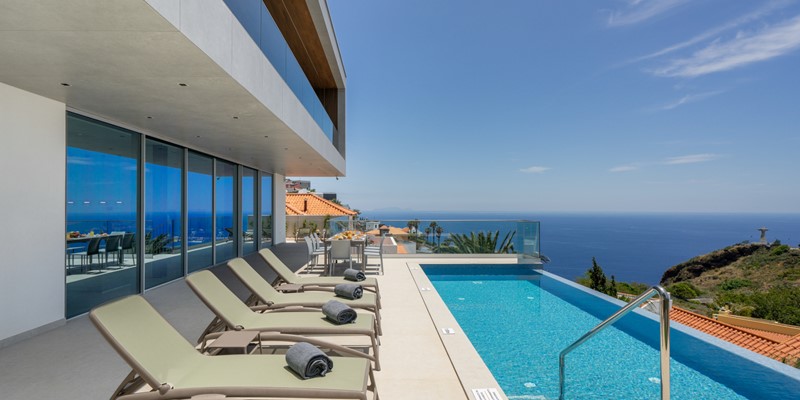 The Modern Facade And The Spacious Outdoor Area At Villa Grandview Cristo Rei By Ourmadeira