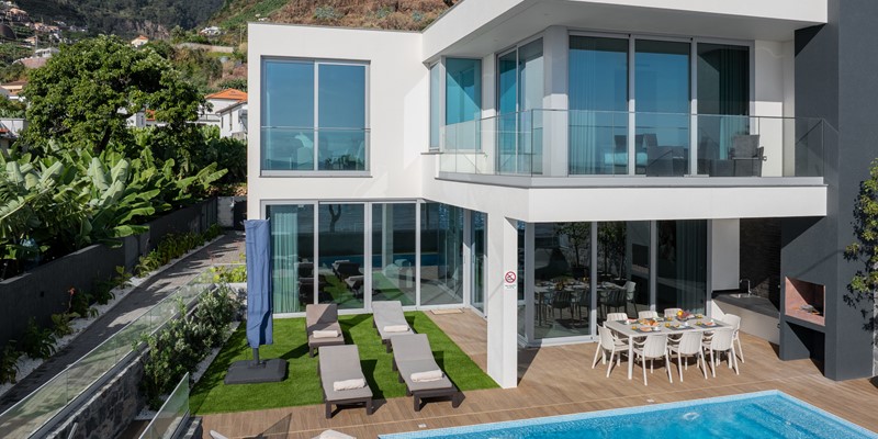 The Modern Glass Picture Windows Outside Dining And Swimming Pool At Beachfront By Ourmadeira