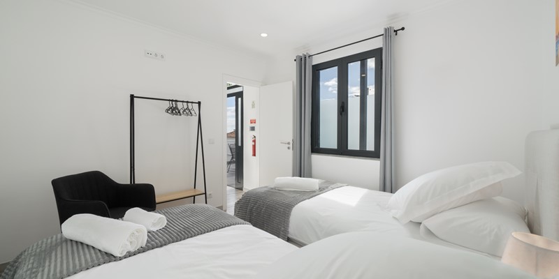 The Twin Bedroom And Clothes Rail At Casa Da Vinha By Ourmadeira