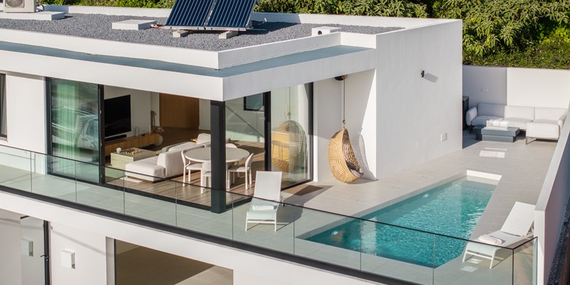 A View Over The Modern Furnishings And Outside Areas At Amani By Ourmadeira