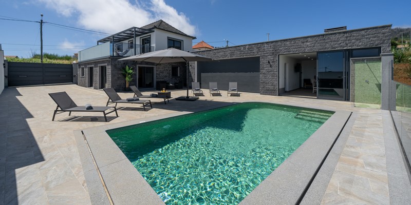 The Swimming Pool And Large Pool Deck Complemented By The Barbecue Room At Casa Da Leonor By Ourmadeira