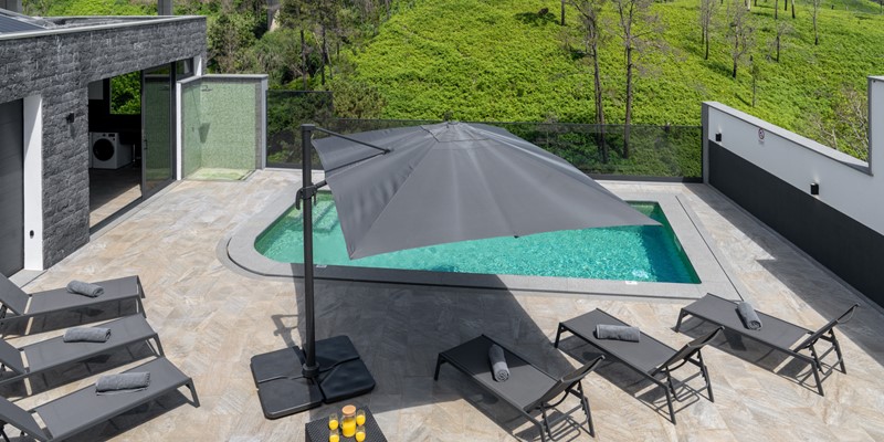 The Aerial View Over The Swimming Pool And Barbecue Area Highlights The Perfect Space For Relaxation And Outdoor Living At Casa Da Leonor By Ourmadeira