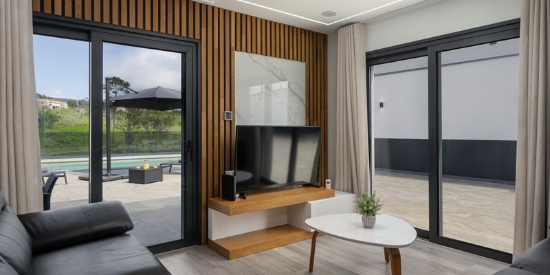 The Spacious Living Area Seamlessly Connects To The Pool Terrace Where Stunning Panoramic Countryside Views Create A Tranquil Setting At Casa Da Leonor By Ourmadeira