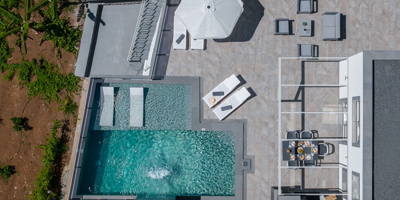A View Over The Swimming Pool With Baja Ledge Outdoor Dining And Sun Terrace At Casa Da Maria By Ourmadeira