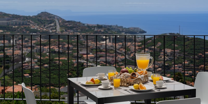 The Dining Area And Beautifull Views At Solmar Apartment By Ourmadeira