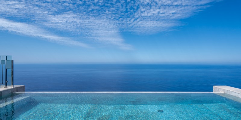 The Sparkling Pool Seems To Melt Into The Deep Blue Atlantic At Ocean Hills By Ourmadeira