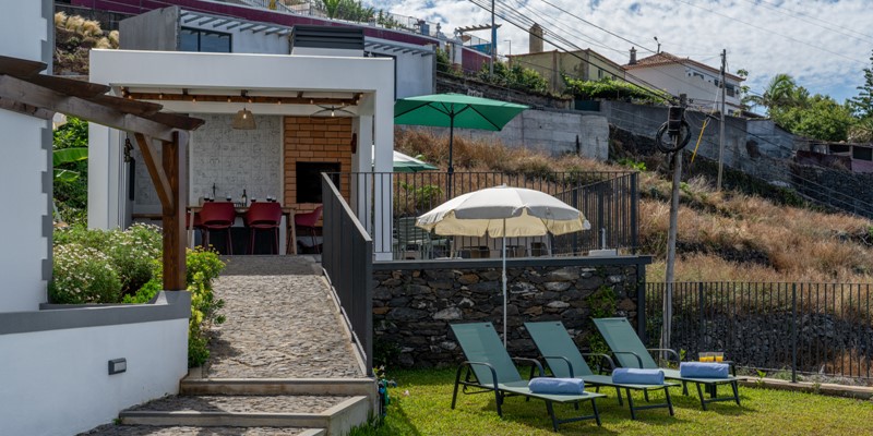 The Pool Deck And BBQ Area At Ocean Hills By Ourmadeira